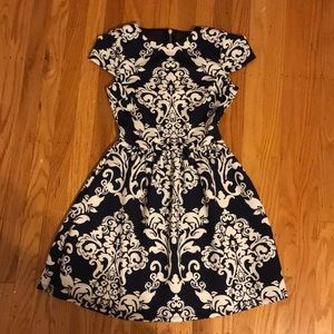 Navy and white floral dress with mesh backing.